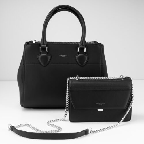 Zwei schwarze Fashion Bags von Trisa Accessoires, vor weissem Hintergrund.